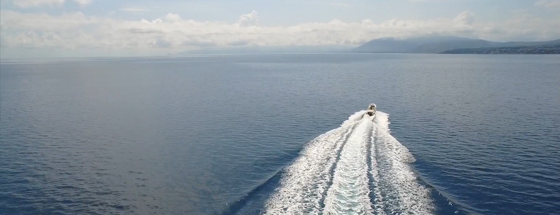 A yacht heading across open water